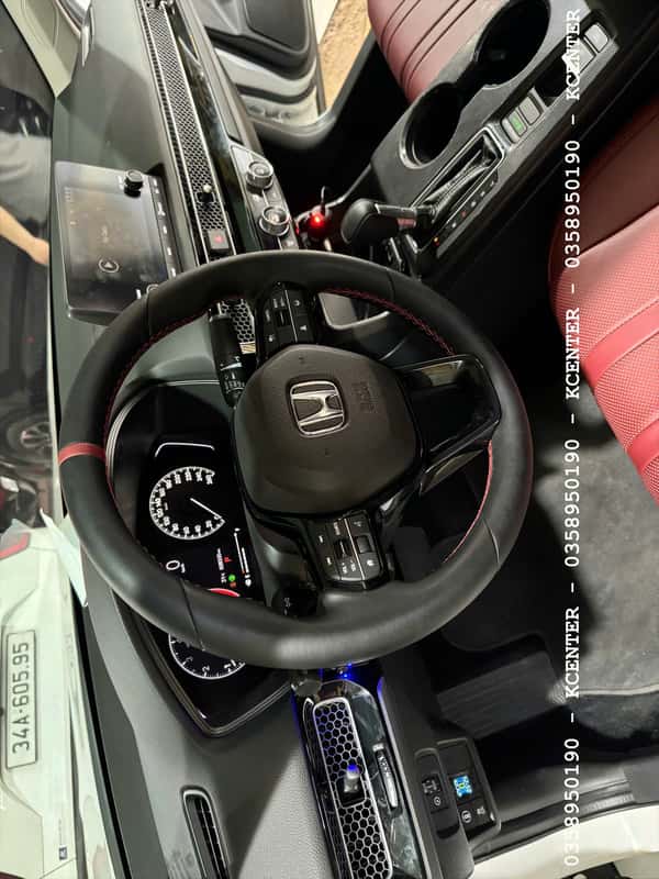 khâu da vô lăng cho xe honda